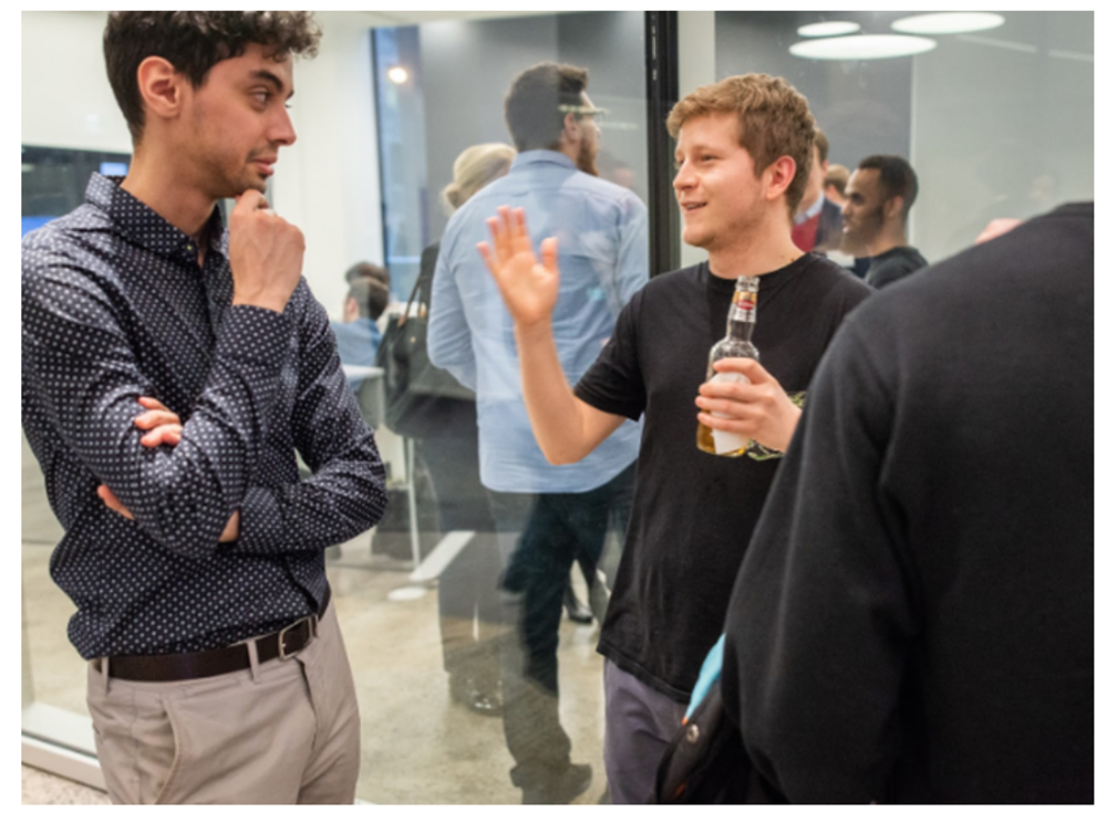 Zakaria Frooni (Founder at Nextax) (left) listening to an enthusiastic participant at FormFintech’s Ascension Demo-Day