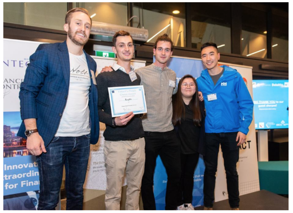 Jan Arp, Managing Partner at the Holt Accelerator (left) presenting his award to co-founders of Krypto, Alexandre Roubaud (2nd from left), Gauthier Gidel (3rd from left), Tommy Luo (extreme right), and Loreina Chew (2nd from right).